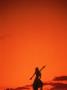Silhouette Of Hawaiian Woman At Sunset by Jack Hollingsworth Limited Edition Print