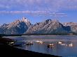 Boats On Jackson Lake And Distant Mountains by Alice Grulich-Jones Limited Edition Print