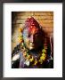 Deity With Garlands And Bindi Powder, Bhaktapur, Bagmati, Nepal by Anthony Plummer Limited Edition Print