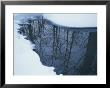 Reflection Of Trees On A Stream Bordered By Snow by Todd Gipstein Limited Edition Pricing Art Print