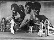 Standing By A Benetton Advertisement - Camden, London by Shirley Baker Limited Edition Print