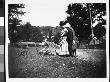 Mrs. Tomi With Jo Grimwood And Her Daughter Zelma Playing With Cats Out In The Country by Wallace G. Levison Limited Edition Print