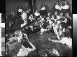 Balladeer Burl Ives Playing Guitar, Singing Amidst Group Of Girls As Nuns Look On by Wallace Kirkland Limited Edition Print