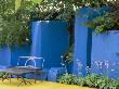 Contemporary Metal Garden Furniture, Vivid Blue Walls, Yellow Concrete Floor And Hostas, Hampton by Clive Nichols Limited Edition Pricing Art Print