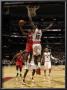 Philadelphia 76Ers V Toronto Raptors: Louis Williams And Amir Johnson by Ron Turenne Limited Edition Pricing Art Print