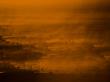 Herd Of Burchell's Zebras Raising Dust Clouds At Twilight by Beverly Joubert Limited Edition Print